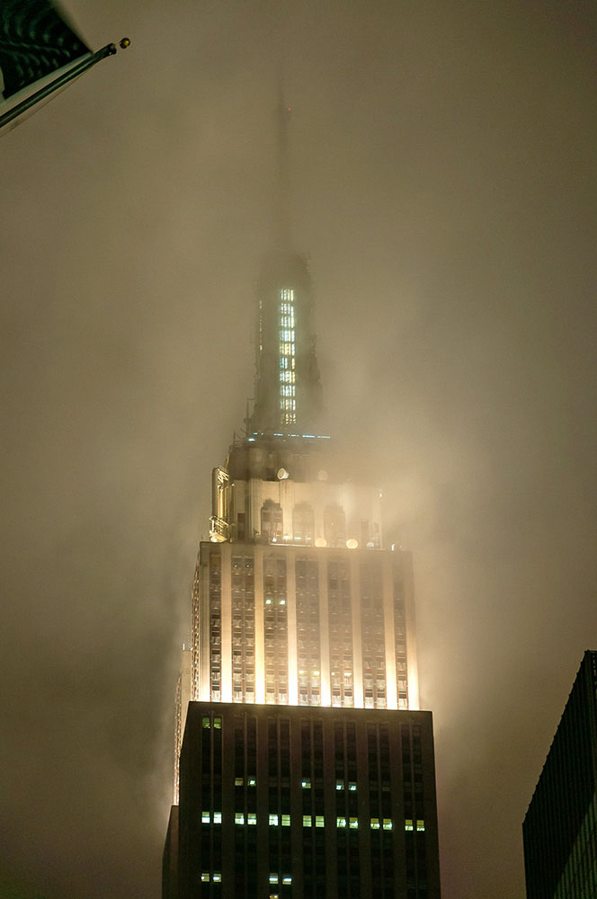 Empire State building in clouds